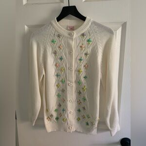 White Embroidered Cardigan fits like a XS because it is vintage!
